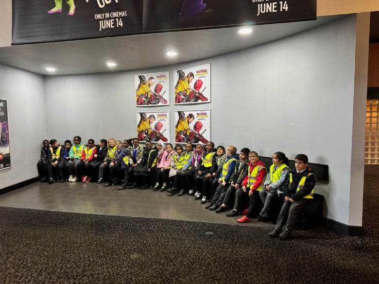 Children in cinema foyer.