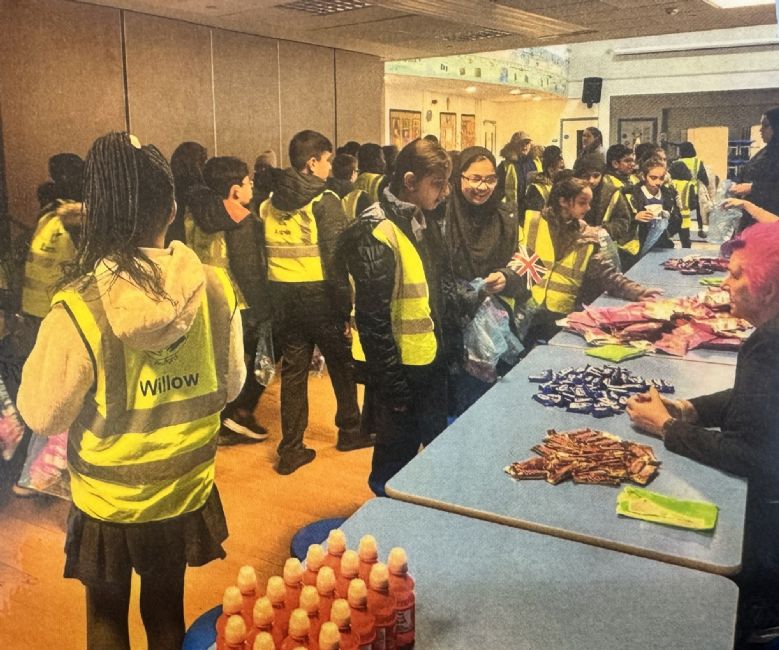 Children in cinema foyer getting snacks.